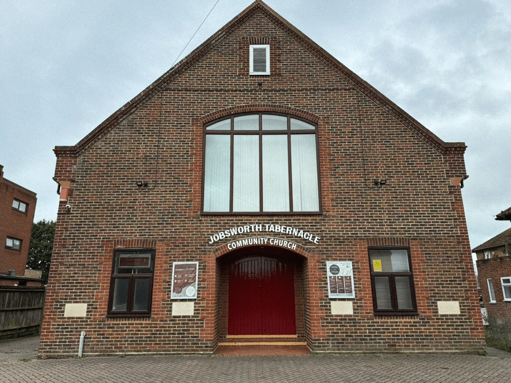 a big dull brick building on a dim dreary day with the words 'jobsworth tabernacle community church'